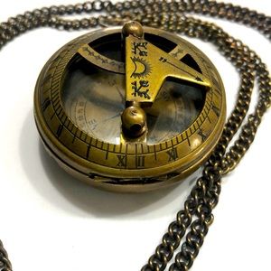 Brass sundial necklace with long chain atrached